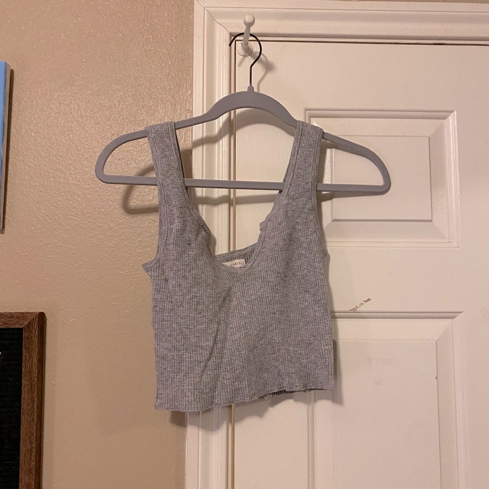 grey soft cropped tank top with v cut out on top